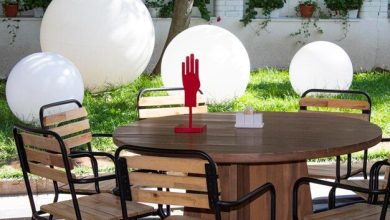 outside-cafe-there-are-tables-chairs-without-people_936075-207-3124437