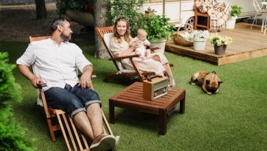 family-with-baby-dog-spending-happy-time-together-near-trailer-outside-deck-chair-traveling-lifestyle-with-camper_211214-81-9519401