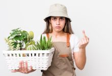 pretty-hispanic-woman-feeling-angry-annoyed-rebellious-aggressive-plants-gardering-concept_1194-393630-9704197
