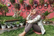 woman-sitting-plants_1048944-11902064-1345087